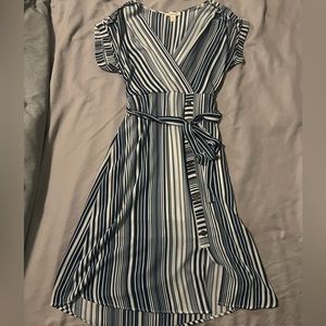 Navy and white dress. Goes to the knees